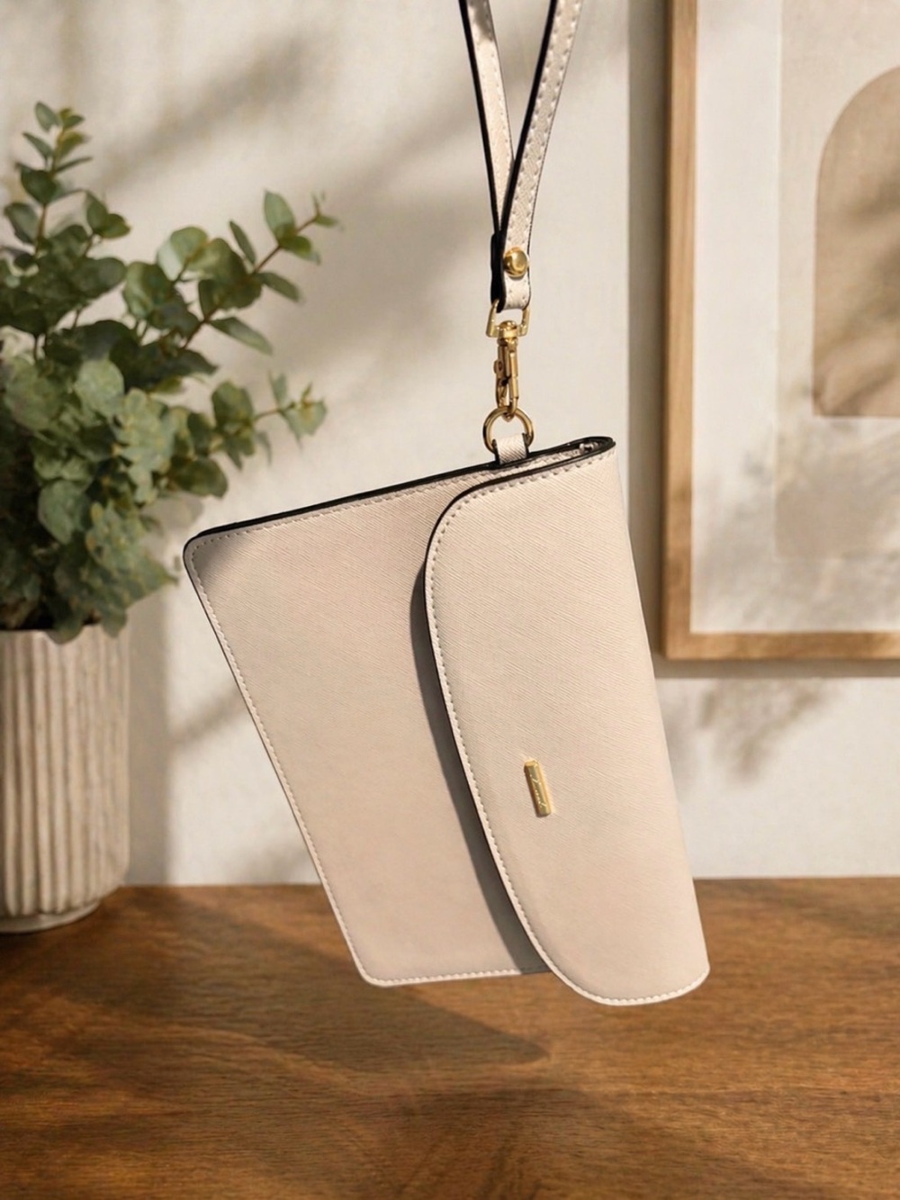 Elegant Cream Wristlet Clutch with Gold Accent